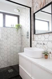 Designing a bathroom to suit your needs requires an attention to detail and a practical approach to the space. Looking For Tiles For Your Small Bathroom Bathroom Design Small Bathroom Design Bathroom Design Small