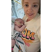 Decorating with baby clothes is a great way to add a personal touch to your  baby shower. Here's a simple and creative way