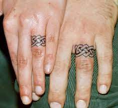 Pin By Amy Kennedy On Marwidge Finger Tattoos Celtic Ring Tattoo Ring Finger Tattoos