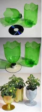 bricolage pot de fleurs en plastique une idee pour la fete des meres vu sur pinterest pots de fleurs en plastique bricolage pot de fleurs bouteille plastique diy
