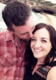 Kathy Parker's Australian farmer husband herds sheep into a love heart