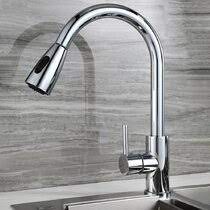 An excellent way to complement this design is to add in a dash of wood or metal. White Kitchen Faucets Wayfair