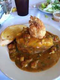 Cajun Potato From Merci Beaucoup In Natchitoches Louisiana A Stuffed Potato Topped With Crawfish Etouffee And A Jum Louisiana Recipes Crawfish Etouffee Food