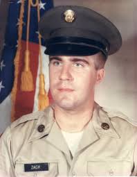 Jim Morton, faithful turkey shooter, in his commemorative chair. A modified  and blinged Legion barstool brought up from the basement and back to life. 