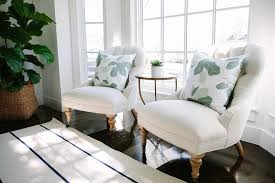 From statement silhouettes to slipper seats, here's the rundown on types of accent chairs and great ways to decorate with them. Home Office Bay Window With Ivory Tufted Chairs And Jules Accent Table Transitional Den Library Office