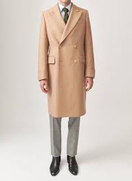 Subtle and uncomplicated, this will work well over tailored clothes or cashmere layers and will live in your wardrobe for years to come. Double Breasted Twill Coat Camel Husbands Paris Husbands Paris