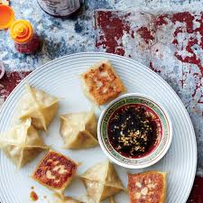 Ginger Shrimp Pot Stickers Spicy Peanut Dipping Sauce Recipe Myrecipes