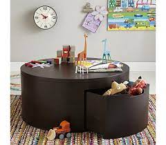 Consider positioning a long coffee table directly in front of the sofa. Storage Coffee Table Play Table Kids Play Table Coffee Table With Storage