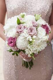 With her 400 different types, colours representing the entire colour spectrum and her many different sizes, the chrysanthemum is a real success during the. Chrysanthemums Bridal Bouquet Google Search Chrysanthemum Bridal Bouquet Chrysanthemum Wedding Bouquet Chrysanthemum Bridal