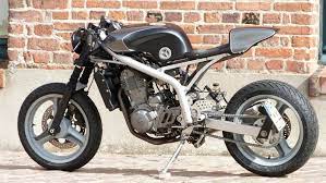 nice built using a cagiva 125 mito tank and a custom subframe seat chassis fork engine and wheels appear to be stock cafe racer motorcycle bike cafe racer