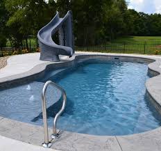 Skimming the surface for debris and vacuuming. The Best Fiberglass Swimming Pool Manufacturer In The Usa