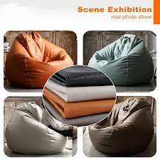Amazon.com: SXBCyan Big Luxury Sofa Pouf Cover Faux Leather Waterproof Lazy  Bean Bag Chair No Filler Outdoor Beanbag Couch Puff (Color : Orange, Size :  60CM) : Home & Kitchen