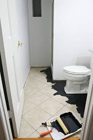 Diy Painted Stencil Bathroom Floor The Home Depot Blog Painted Bathroom Floors Painting Tile Floors Painting Bathroom Tiles
