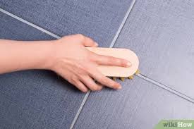 You can protect the grout from further stains by applying a. How To Clean And Re Grout Bathroom Tile 8 Steps With Pictures