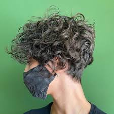 The neatly shaved sides and incredibly voluminous top keep the unruly hair type neat and comfortable. 30 Top Curly Pixie Cut Ideas To Choose In 2021 Hair Adviser