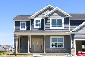 Take your pick of the following. Natural Slate Siding Deep Granite Shakes Deep Granite Board And Batten Moire Black Roof In Savoy Il Carlson Exteriors Inc