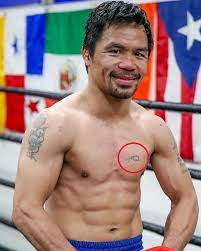 You are looking at a die struck pin of manny pacquiao's first tattoo. Manny Pacquiao S 6 Tattoos Their Meanings Body Art Guru