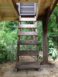 I had to build some ground stuff to get high enough to attach the middle/lower ladder pieces. Building Our Modern Treehouse Slanted Roof Merrypad