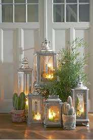 Similar decorative lanterns can be decorated with flowers, cones and other materials. Julian Lantern Antique Silver Lifestyle Home Collection Lanterns Decor Candle Decor Outdoor Hanging Candle Lanterns
