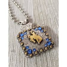 Her name is mena, she is 6 years old, and was a mother's day gift 6 years ago. Steamboat Bucking Horse Bead Ball Necklace Gold All Colors My Wyo Designs