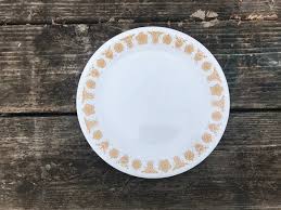 Lot of three tiny china figures, 3 to 3 3/4 tall. Vintage Corelle Butterfly Gold Glass Plate 18 700 Ppm Lead On The Decorative Pattern When Tested With An Xrf Instrument