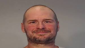 Man arrested after threatening another man with machete over 'white people'  joke