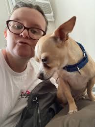 Hi, thanks for letting me join. I'm more of a cat girl, but I love dogs  too. I don't have a dog but this is my friends dog. Her name is Bella