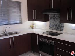 Mahogany Kitchen Cupboards With White Counter Tops Cheap Countertops Countertops Diy Countertops