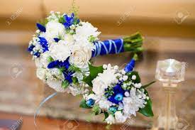 To download this blue and white wedding bouquet in high resolution, right click on the image and choose save image as and then you will get this image about you can see another items of this gallery of 25+ most romantic wedding with hydrangea bouquet ideas that you need to see below. Beautiful Blue And White Wedding Bouquet Of Roses On Glass Table Stock Photo Picture And Royalty Free Image Image 64336154