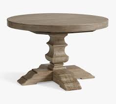 Here it is, my extending dining table of dreams. Banks Round Pedestal Extending Dining Table Pottery Barn