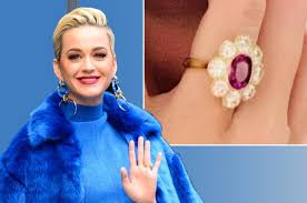 The singer captioned the photo, full bloom, while bloom. The Surprising History Behind Katy Perry S Engagement Ring