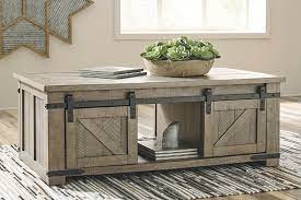 Woodboro lift top cocktail table by ashley furniture. Aldwin Coffee Table Ashley Furniture Homestore