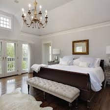 Large white and wood bedroom with light wood floor, white furniture. 10 Modern Master Bedroom Design Ideas Design Cafe