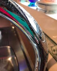 white mites on her kitchen tap