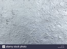 Close Up Of An Uneven Wall Painted With Chrome Spray Paint Texture Background Stock Photo Alamy