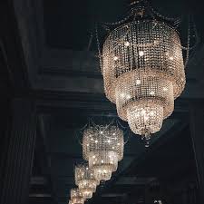 It Swallows Me Up Like A Gulp Of Hot Tea Burning My Insides But Feeling So Good I Must Stare Up At The Chanderliers With My Own Chandelier Light Gold Aesthetic