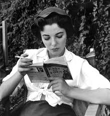 Celebrities Reading What S Your Favorite Book My Fav S Crime And Punis Celebrities Reading Woman Reading Joan Collins