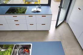 Dark grey kitchen with wood worktop maintenance connection reports. Living Areas Private Agrob Buchtal