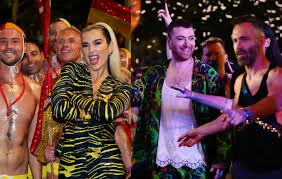 Use the colors of purple, gold and green. Sydney Mardi Gras Sam Smith Appears In Surprise Float Dua Lipa Performs Physical For The First Time