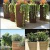 Butterfly trellis wall planter with metal pots. 1