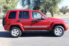 Image result for Flame Red 2006 Jeep