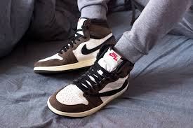 Here S An On Foot Look At Travis Scott S Air Jordan 1 Cactus Jack Travis Scott Shoes Air Jordans Jordan Retro 1