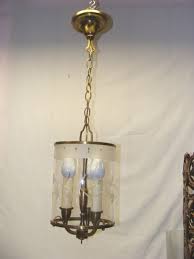 For symmetry, hang a pair of smaller crystal chandeliers on either side of the bed. Brass With Etched Glass Cylinder Chandelier Light Fixture Leffler S Antiques