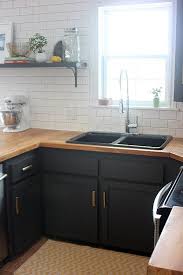 Dark Grey Cabinets And Wooden Countertops Sophie Leger S Recent Home Renovation Kitchen Renovation Kitchen Design Home Kitchens