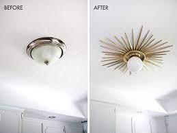 The fixture features a frosted glass shade and holds two 40 watt bulbs. Sunburst Mirror Medallion Diy A Beautiful Mess