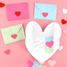Cut out a heart shape through the layers, so that you will end up with five identical paper or card hearts. How To Make A Heart Envelope I Heart Crafty Things