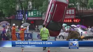 sinkhole in china swallows 4 cars