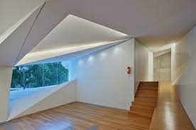 Inspired by the movement of a conductor´s baton, the building design is composed of five concrete roofs moving up and down in harmony to give shape, space and light to the project. Roberto Cantoral Cultural Center Broissin Architects Arch2o Com