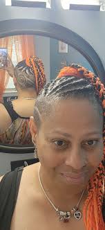 Orioles Fan Shows Team Spirit with Unique Hairstyle