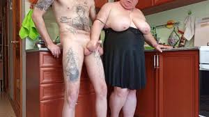 mother-in-law with big tits saw my standing cock and began to masturbate it  until I cum